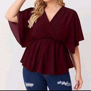 Plus size peplum shirt